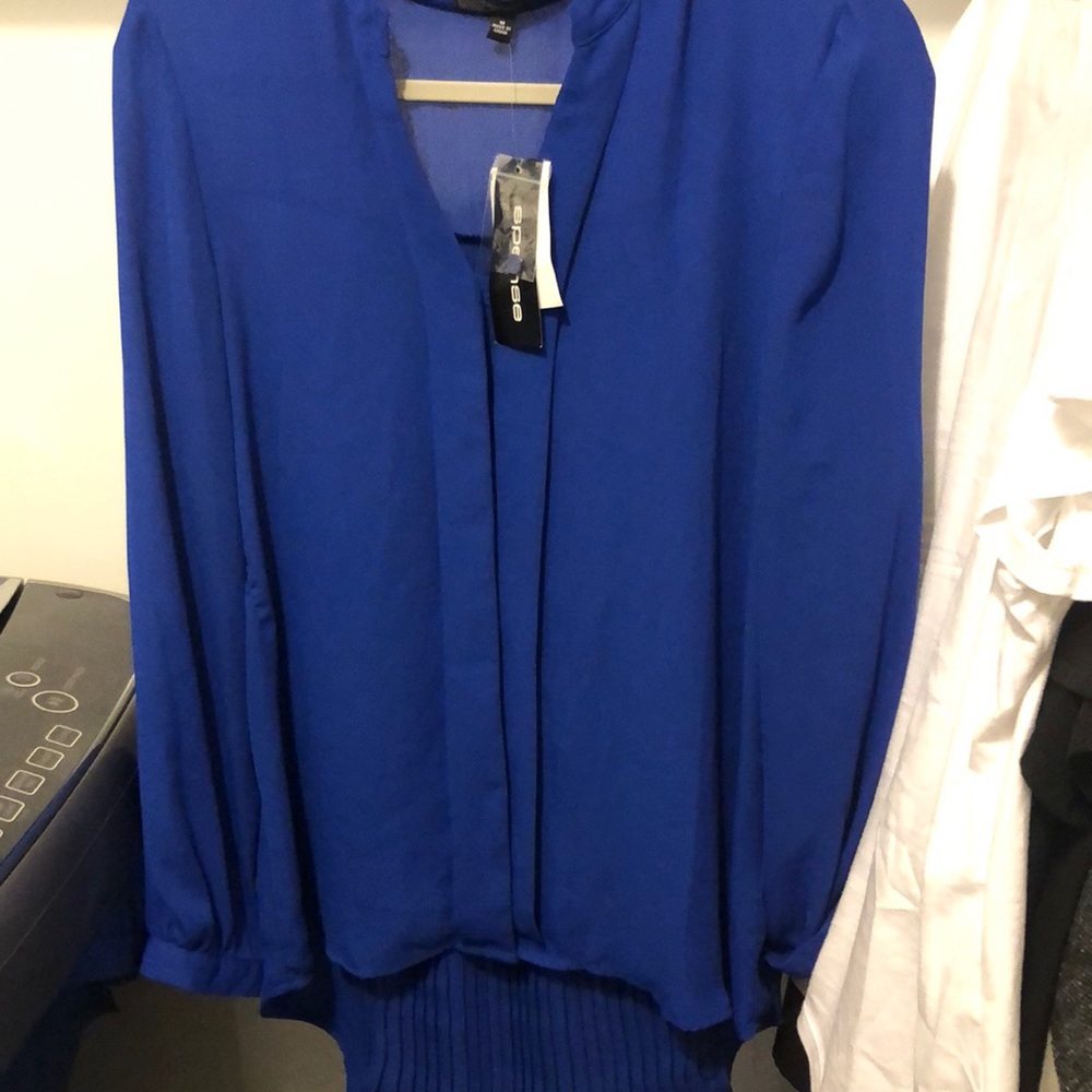 Blouse size medium. New with tags.